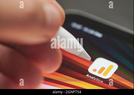 New york, USA - September 24 2021: Start google analytics ads on ipad  screen close up view using pen Stock Photo