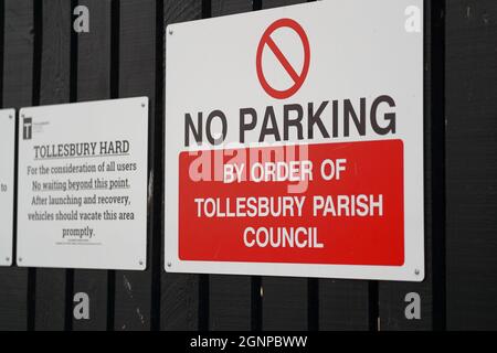 No Parking sign in Tollesbury harbour, Tollesbury, Essex, UK Stock Photo