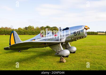 Highly polished Ryan STM-2 open cockpit, two seat trainer aircraft. 1940's American vintage in the colours of the Netherlands. At Old Warden aerodrome Stock Photo