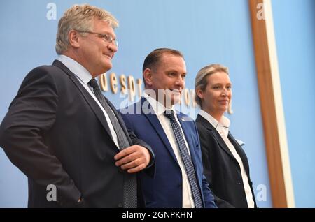 Berlin, Germany. 27th Sep, 2021. The AfD's top candidates in the federal election, Tino Chrupalla (M) and Alice Weidel, as well as Jörg Meuthen, the AfD's federal spokesman, come to the Federal Press Conference to comment on the outcome of the federal election. Credit: Julian Stratenschulte/dpa/Alamy Live News Stock Photo