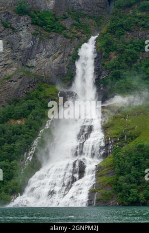 GEIRANGER, NORWAY - 2020 JUNE 21. Waterfall Friaren Geiranger fjord. Stock Photo