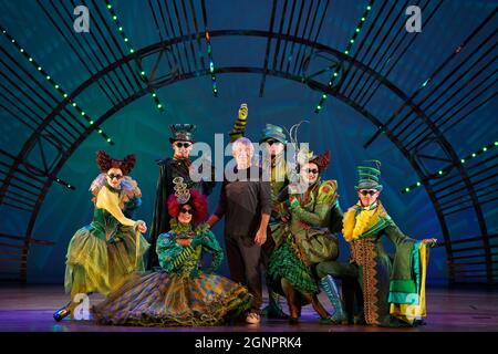 Composer Stephen Schwartz (centre) surrounded by actors dressed as Ozions on stage during the 15th anniversary celebrations for the musical Wicked, as it re-opens at the Apollo Victoria Theatre in London. Picture date: Monday September 27, 2021. Stock Photo