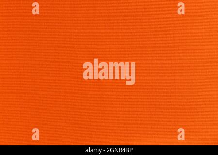 bright orange fabric background. ribbed texture Stock Photo