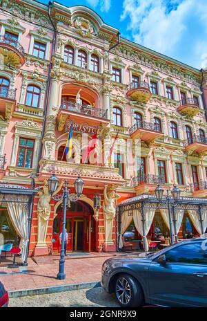 ODESSA, UKRAINE - JUNE 18, 2021: The entrance to the Hotel Bristol, surrounded with sculptures of atlantes and moulding, on June 18 in Odessa