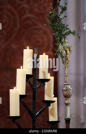 Saint Francois de Sales basilica. Church candels and crucifix.  Thonon. France. Stock Photo