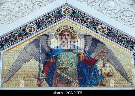 Mosaic of Saint Michael on the facade of Saint Spyridon Orthodox Church.  Trieste.  Italy. Stock Photo