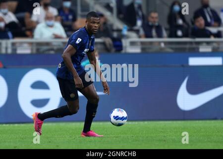 Denzel Dumfries of Fc Internazionale  controls the ball during the Serie A match between Fc Internazionale and Atalanta Bc at Stadio Giuseppe Meazza . Stock Photo