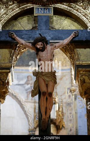 The Convent of Christ. Interior of the Round church decorated with late Gothic painting and sculpture. The crucifixion. Jesus on the cross.  Tomar. Po Stock Photo