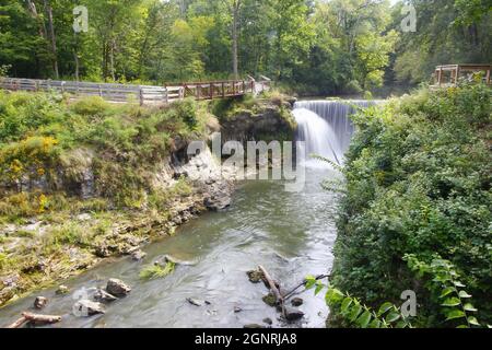 Famous beautiful Cedar Cliff Falls manmade waterfall falling down into the Massie Creek gorge Stock Photo