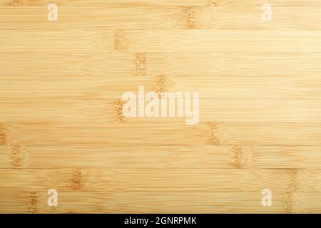 Bamboo background. Treated bamboo wood surface for countertops, furniture and tableware. High quality photo Stock Photo