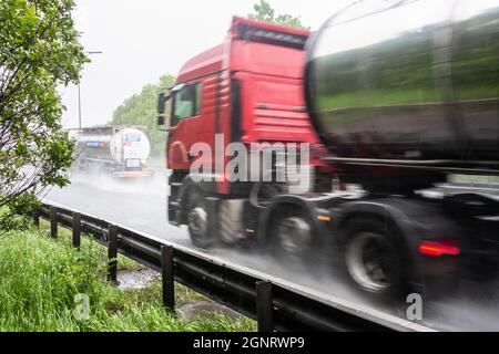 Fuel tanker, HGV lorry on UK motorway, HGV driver shortage, fuel panic buying, Brexit shortages concept. Stock Photo
