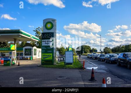 Vehicles in queue waiting to get into BP filling station 27th September 2021, Watling Street, St. Albans Hertfordshire UK Stock Photo