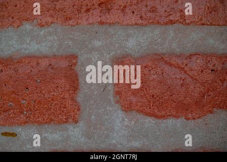 Close-up shot of an orange brick. Stock Photo