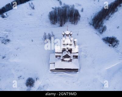 Wooden church in an abandoned Russian village. Russia, Arkhangelsk region, Onezhsky district Stock Photo