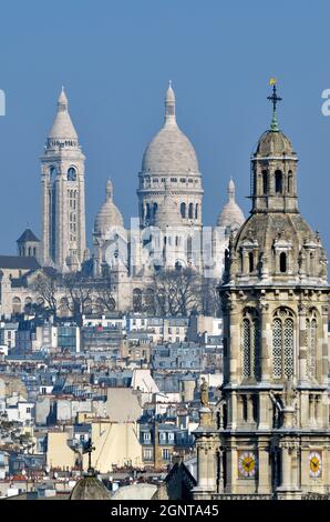 France, Paris (75), la basilique du sacré-Coeur de Montmartre et le clocher de l'église de la Sainte-Trinité // France, Paris, the Basilica of the Sac Stock Photo