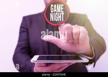 Conceptual display Game Night. Business idea usually its called on adult play dates like poker with friends Presenting New Technology Ideas Discussing Stock Photo