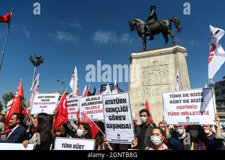 Ankara, Turkey. 27th Sep, 2021. Protesters hold placards expressing their opinion during the demonstration.The Youth Union of Turkey (TGB) protested the pro-Kurdish Peoples' Democratic Party (HDP) and the Kurdistan Workers' Party (PKK) at Ulus Atatürk Square. Credit: SOPA Images Limited/Alamy Live News Stock Photo