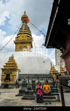 Kathmandu, Nepal - September 2021: People visiting the Swayambhunath Stupa. It is an ancient religious complex in Kathmandu, Nepal. Stock Photo