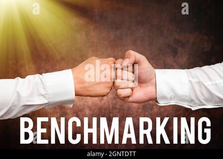Conceptual display Benchmarking. Business concept evaluate something by comparison with standard or scores Two Professional Well-Dressed Corporate Stock Photo