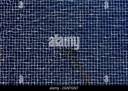 Abstract background from distortion of water wave in swimming pool. Black and white tone. Backdrop for design art work Stock Photo