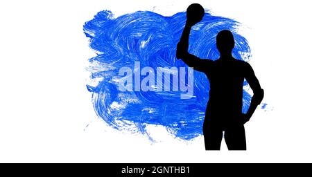 Silhouette of female handball player against blue paint brush strokes on white background Stock Photo