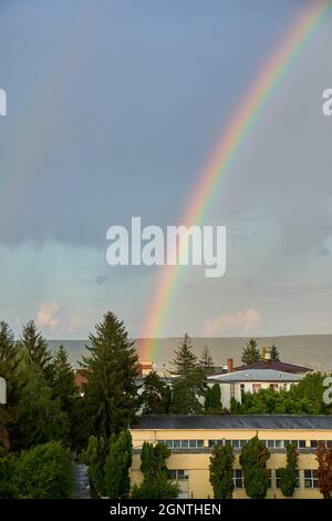 Double rainbow in the purple evening sky Stock Photo - Alamy