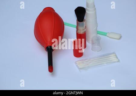 High angle view DSLR Camera Cleaning Kit blower,brush,lens cleaner isolated on white background negative space to write text Stock Photo