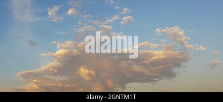 Dramatic late afternoon clouds on the horizon panorama suitable for background use or sky substitution Stock Photo