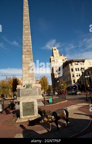 Pack Square pigs with the Vance Monument and Neo-Gothic Jackson Building in Asheville, North Carolina. Stock Photo