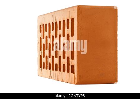 Perforated red brick isolated on white background Stock Photo
