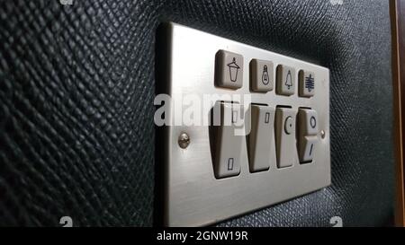Seventies style switch panel for hotel. Closeup Stock Photo