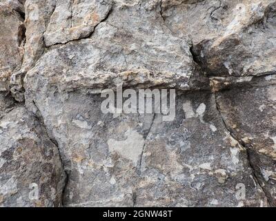 Abstract Rough Fractured Natural Coastal Rock Face Stock Photo