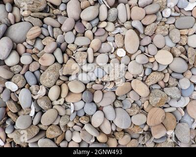 Variegated Smooth Coastal Beach Rocks And Pebbles Stock Photo