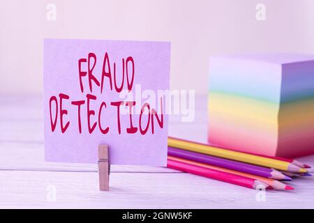 Writing displaying text Fraud Detection. Word Written on identification of actual or expected fraud to take place Blank Sticky Note Laundry Clip Stack Stock Photo