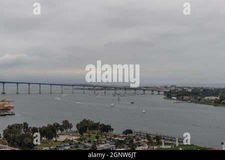 Scenic aerial panoramic San Diego Bay vista on a heavily overcast day, Southern California Stock Photo