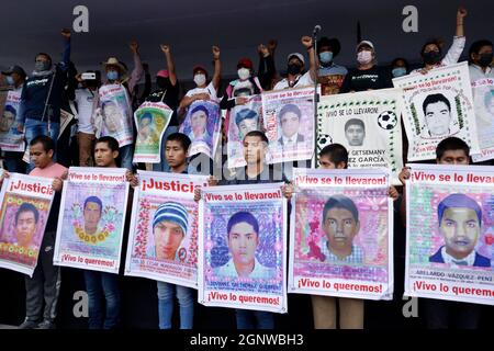 Non Exclusive: Relatives of the 43 students of the Normal Rural Isidro Burgos of Ayotzinapa, take part during a  demonstration demanding justice for t Stock Photo