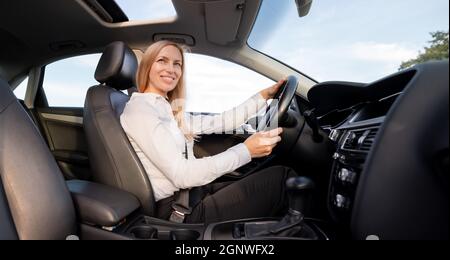 Woman driving car Stock Photo