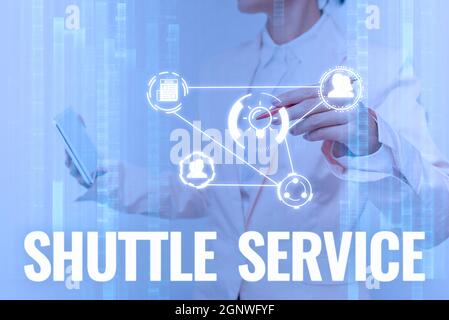 Hand writing sign Shuttle Service. Internet Concept vehicles like buses travel frequently between two places Lady In Uniform Touching And Using Stock Photo