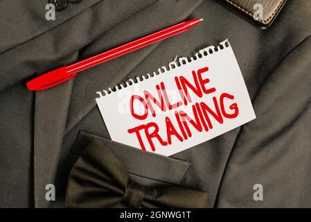 Sign displaying Online Training. Concept meaning Take the education program from the electronic means Presenting New Proper Work Attire Designs Stock Photo
