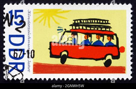 GDR - CIRCA 1967: a stamp printed in GDR shows Fire Truck, Children’s Drawing, circa 1967 Stock Photo