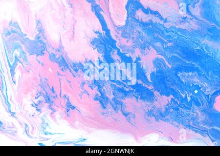 Acrylic texture made in fluid pour technique. Background in pink, white and blue colors. Stock Photo