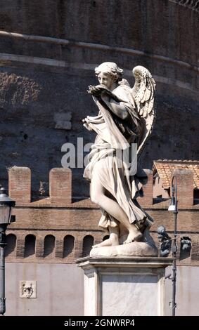 Statue of Angel with the Sudarium (Veronica's Veil) by Cosimo Fancelli, Ponte Sant Angelo in Rome, Italy Stock Photo