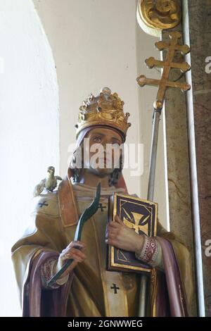 Saint Ambrose statue on the high altar in the Holy Spirit Chapel in Vrtace, Croatia Stock Photo