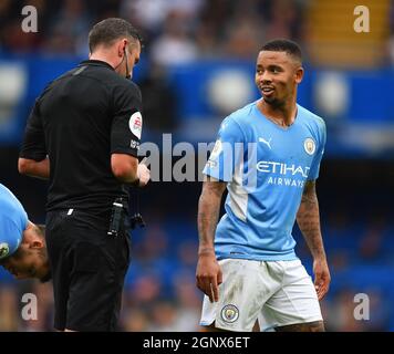 25 September 2021 - Chelsea v Manchester City  - The Premier League - Stamford Bridge  Gabriel Jesus and Referee Michael Oliver during the Premier Lea Stock Photo