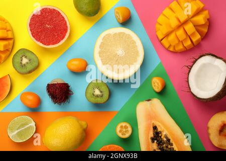 Set of exotic fruits on multicolored background. Stock Photo