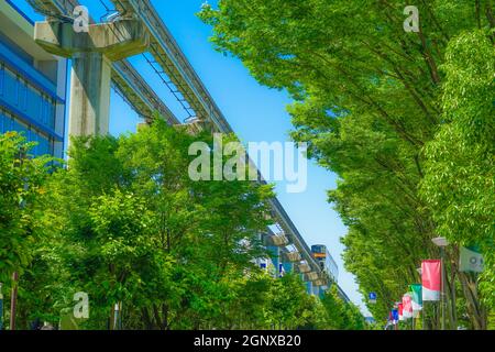 Tama Monorail and the fresh green. Shooting Location: Tokyo Tachikawa Stock Photo