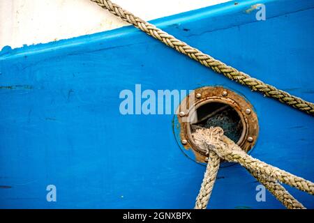 bulwark with mooring lines of a trawler Stock Photo