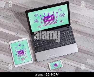 Defi concept shown on different information technology devices Stock Photo