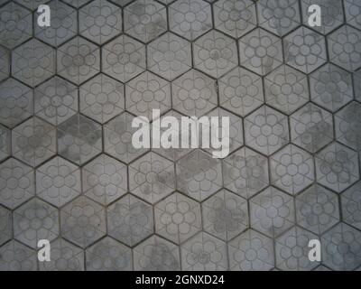The background is the texture of the tile. The pattern and texture of the tile is construction. Stock Photo