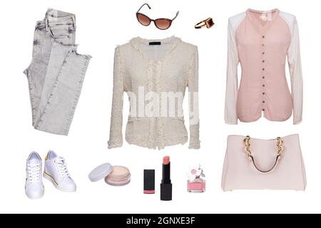 Collage women clothing. Set of stylish and trendy women blouses, jeans, handbag, sneaker and accessories isolated on a white background. Latest fashio Stock Photo